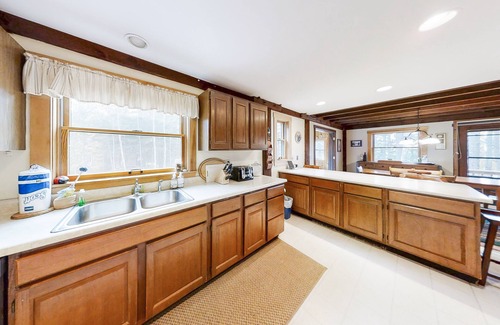 Bayville Cottage | Appalachee Pond Waterfront Cottage | Decks, Sunroom, Dock with Kayaks & Canoe