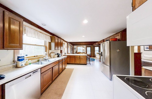 Bayville Cottage | Appalachee Pond Waterfront Cottage | Decks, Sunroom, Dock with Kayaks & Canoe