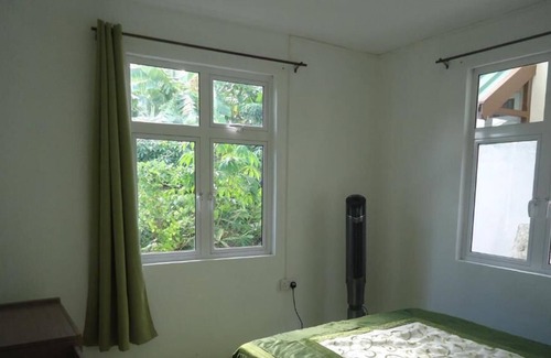 Port Mathurin Apartment | Appart'hôtel overlooking the garden