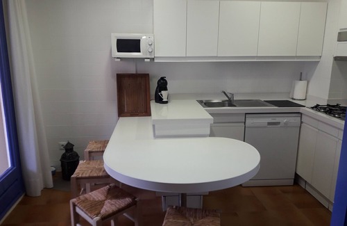 Calella de Palafrugell Apartment | Apt. 200 m. beach, with private garage, air conditioning, swimming pool and concierge. swimming pool and concierge