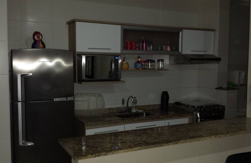 Praia Grande Apartment | Apto Season High Standard Praia Grande Ubatuba, next to the watchtower of the Toninhas