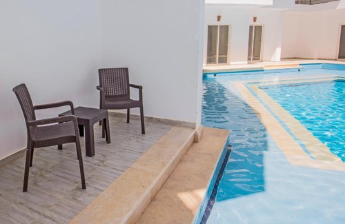 Al Ahyaa Apartment | Aqua Palms Swim-Up Apartment