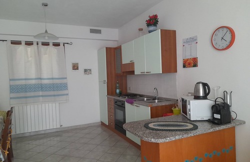 San Teodoro Apartment | Aquamarine villa with garden and wifi