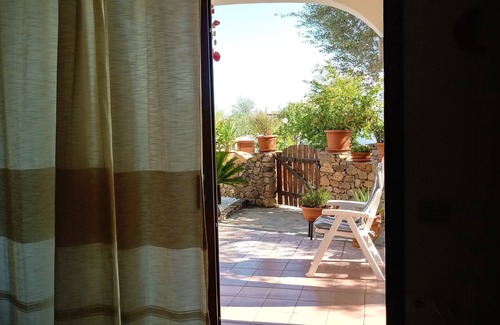 San Teodoro Apartment | Aquamarine villa with garden and wifi
