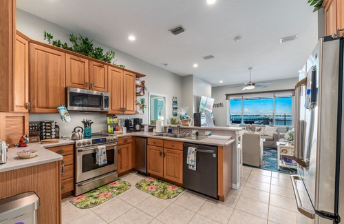 Stuart House | Aquatopia South: Riverfront Beach House, Steps 2 Ocean. Heated Pool & Dock!