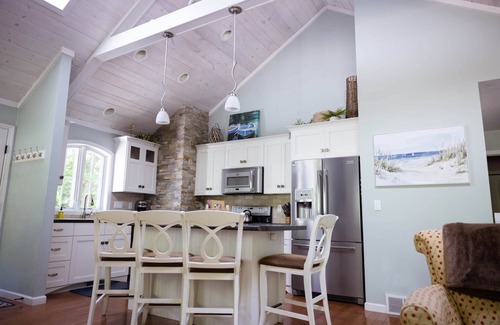 Baileys Harbor House | Arbor Cottage , Charming Wooded Cottage Minutes from Downtown