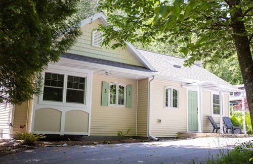 Baileys Harbor House | Arbor Cottage , Charming Wooded Cottage Minutes from Downtown