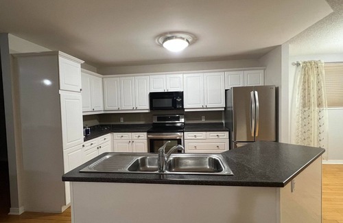 Kingston House | Arbour Ridge Vacation Home - Trail View! 5 bedrooms, 7 beds