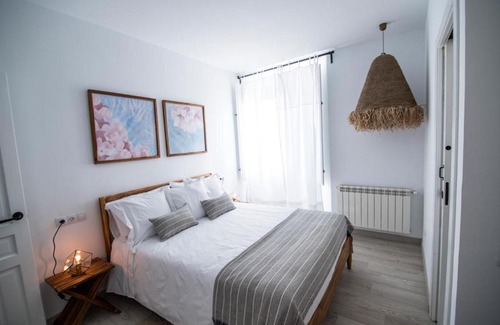 Mondejar House | Arco de la Villa