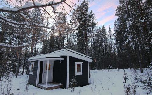 Jukkasjarvi Cabin | Arctic Island - Remote island, reachable only by boat or snowmobile