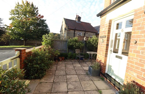 Briggswath Cottage | ARDEN HOUSE, pet friendly, with open fire in Whitby