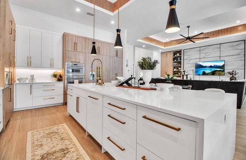Arlington Park House | Arlington Oasis - Luxury 5 Bed Home, Heated Pool, E-bikes by Gulf Coast Holiday Homes
