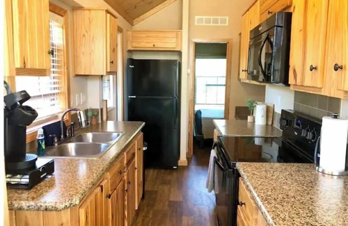 Austin Cabin | Armadillo cabin in a boutique gated tiny home resort with pool!