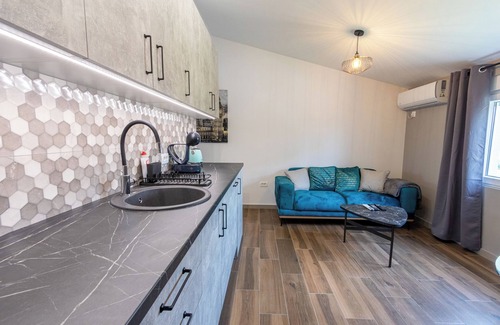 Golubovci Apartment | Art deco-inspired apartment in a quiet area near the Airport