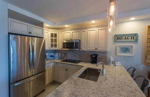 Red Hook Condo | AS SEEN OH HGTV/FULLY RENOVATED BEACHFRONT DUPLEX VILLA. Located in building B.