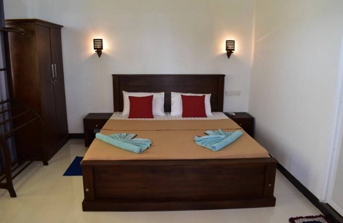 Dodanduwa Bed & Breakfast | Ashen’s Beach House , Boossa , Sri Lanka . (Beachfront Villa with 4 A/C rooms)