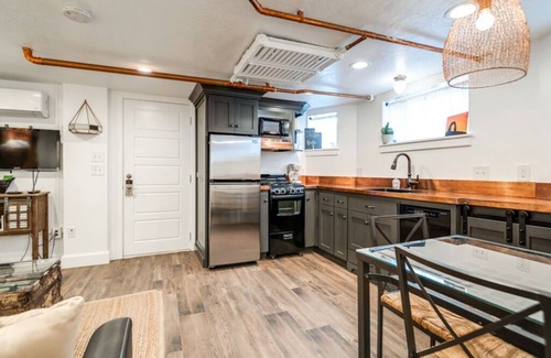 Central Business District Apartment | Aspenwood Manor- Brand New Basement Apartment Inspired by Southern Utah
