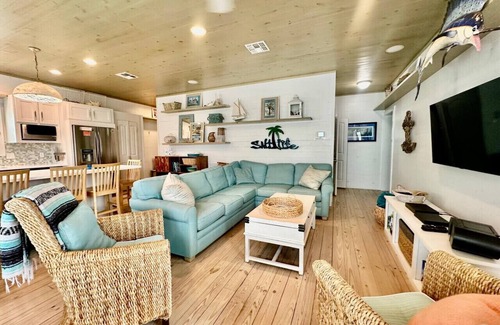 Sand Point House | "At Shore to Please, let the waves serenade you and the sand soothe your soul."