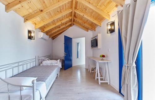 Evdilos Hotel | Atheras