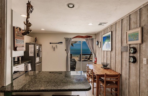 Layton House | Atlantic Ocean Beachfront Duplex With Private Dock and best beach
