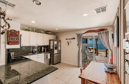 Layton House | Atlantic Ocean Beachfront Duplex With Private Dock and best beach