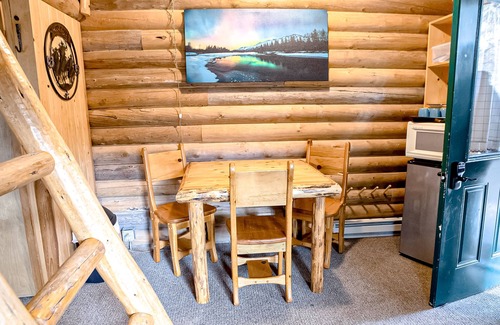 Bigfork Cabin | Atmospheric woodland cabin with firepit, near Glacier & Flathead Lake