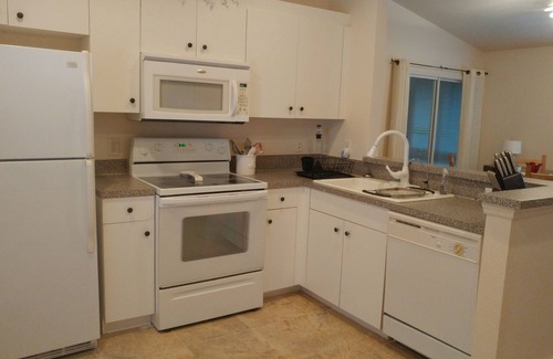 Rural Estates Villa | Attached villa close to beaches, shopping, and restaurants.