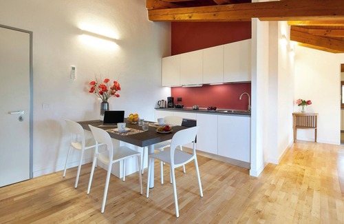 Riva del Garda Apartment | Attic Apartment "Papavero" with Balcony, Views to the Mountains and Wi-Fi