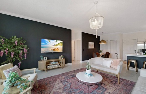 Coquina Gables Condo | Auberge Chic Fleurs - Your Cozy Holiday Retreat by the Sea!