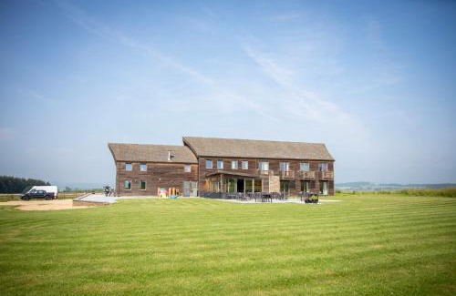 Mousny House | Auberge des Blancs Cailloux