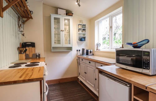 Kingussie Cottage | AULTMORE, family friendly, with open fire in Kingussie