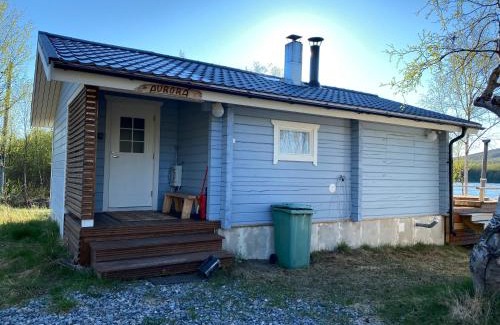 Nuorgam Ski Chalet | Aurora mökki porealtaalla Lapissa Tenojoen rannassa