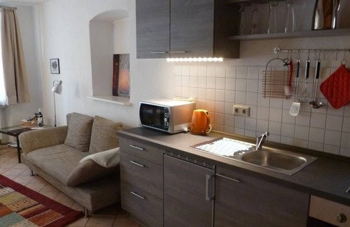 Weisenheim am Berg Bed & Breakfast | Auslese - Holiday apartment - Alter Winzerhof
