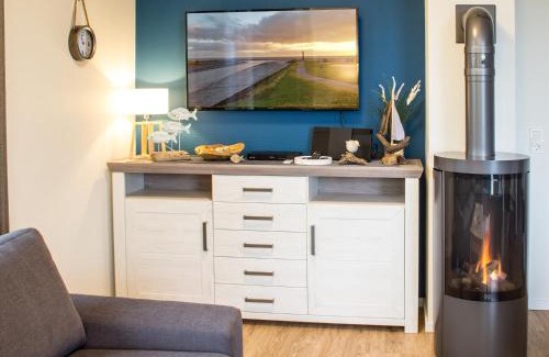 Butjadingen Apartment | Auszeit im Sielhuus - Familienfreundliche Ferienwohnung mit Dachterrasse und Sauna