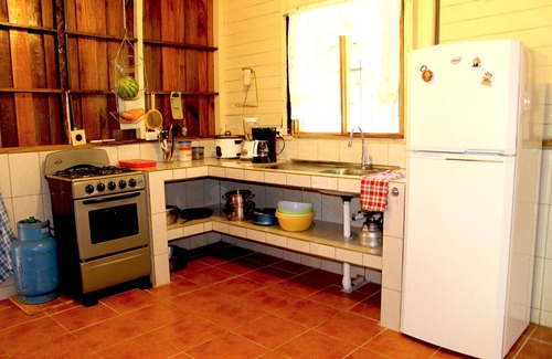 La Suiza Cottage | Authentic Vacation Home in Unique Setting of 25 Acres of Tropial River Landscap