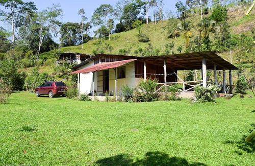 La Suiza Cottage | Authentic Vacation Home in Unique Setting of 25 Acres of Tropial River Landscap