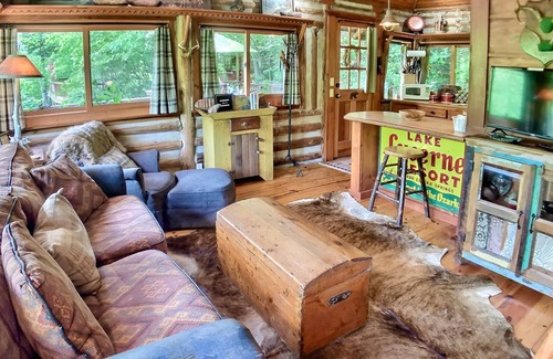 Eureka Springs Cabin | Authentic Lake Lucerne cabin with wrap-around deck, grill, wood stove, views