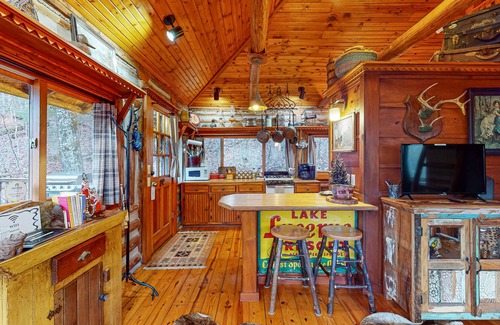 Eureka Springs Cabin | Authentic Lake Lucerne cabin with wrap-around deck, grill, wood stove, views