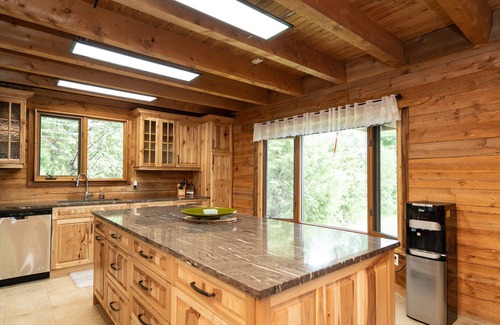 Traverse Bay Cottage | Authentic & Stunning, Rustic Log House located on 28 acres with private road