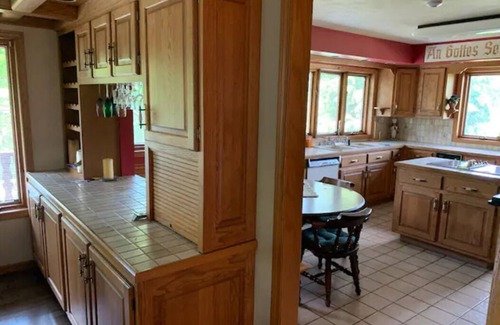 New Glarus House | Authentic Swiss Chalet w/private saltwater pool, sauna, grill, fire pit & more