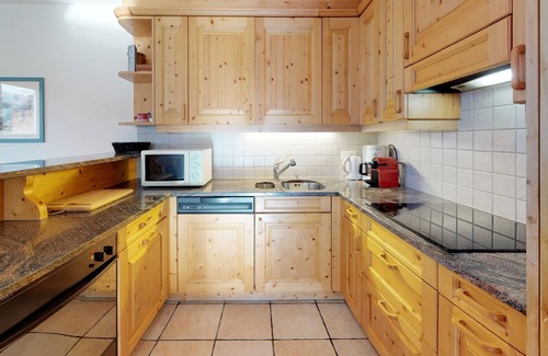 Celerina-Schlarigna Apartment | Authentically beautiful house in the Engadine style.