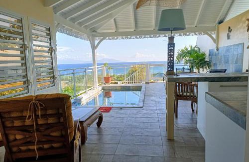 Grand-Bourg House | Aux Colibris Amoureux : loft de standing avec vue mer