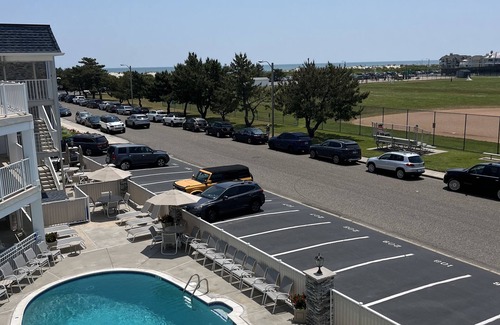 Avalon Condo | AVALON BEACH BLOCK! Renovated, Luxury condo W/heated pool steps to everything