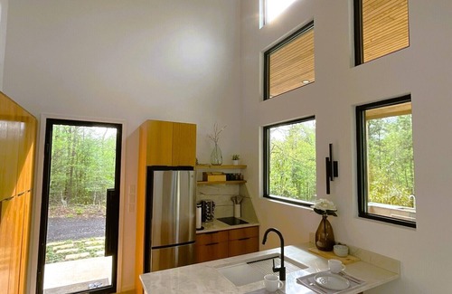 Burkeville Cabin | Avian Acres - Modern Cabin on 65 secluded acres of forest, creeks, and trails.