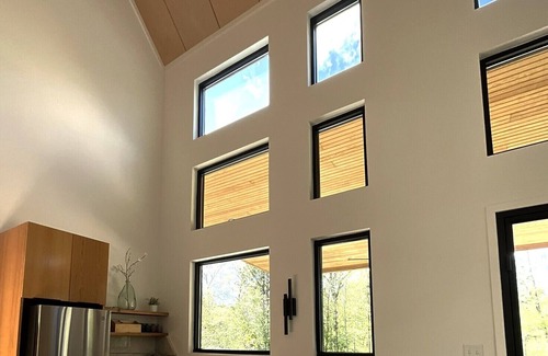 Burkeville Cabin | Avian Acres - Modern Cabin on 65 secluded acres of forest, creeks, and trails.