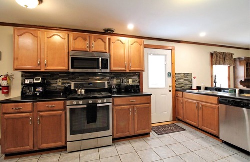 Maryland House | Avon Lakeshore - Waterfront retreat with hot tub!