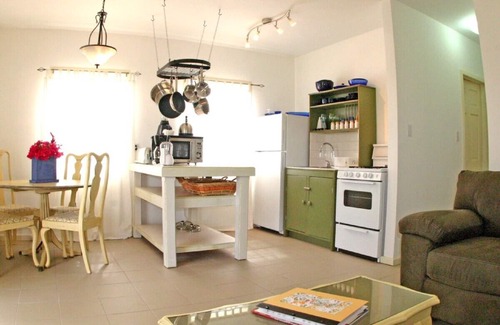 St. John's Cottage | Award-Winning, Charming Cottage in a 6-minute walk from a white sand beach.