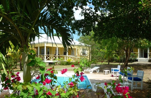St. John's Cottage | Award-Winning, Charming Cottage in a 6-minute walk from a white sand beach.