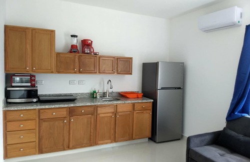 Colonia Centro Condo | Awesome Carribean Views and a Brand New Condo half block from the water!