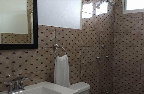 Colonia Centro Condo | Awesome Carribean Views and a Brand New Condo half block from the water!